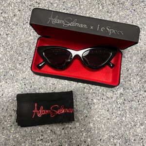 Adam Selman Le Specs with cat eye shape and pearls.